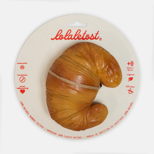 Bébé jouant avec l'anneau de dentition Sam le Croissant Lolaletost
