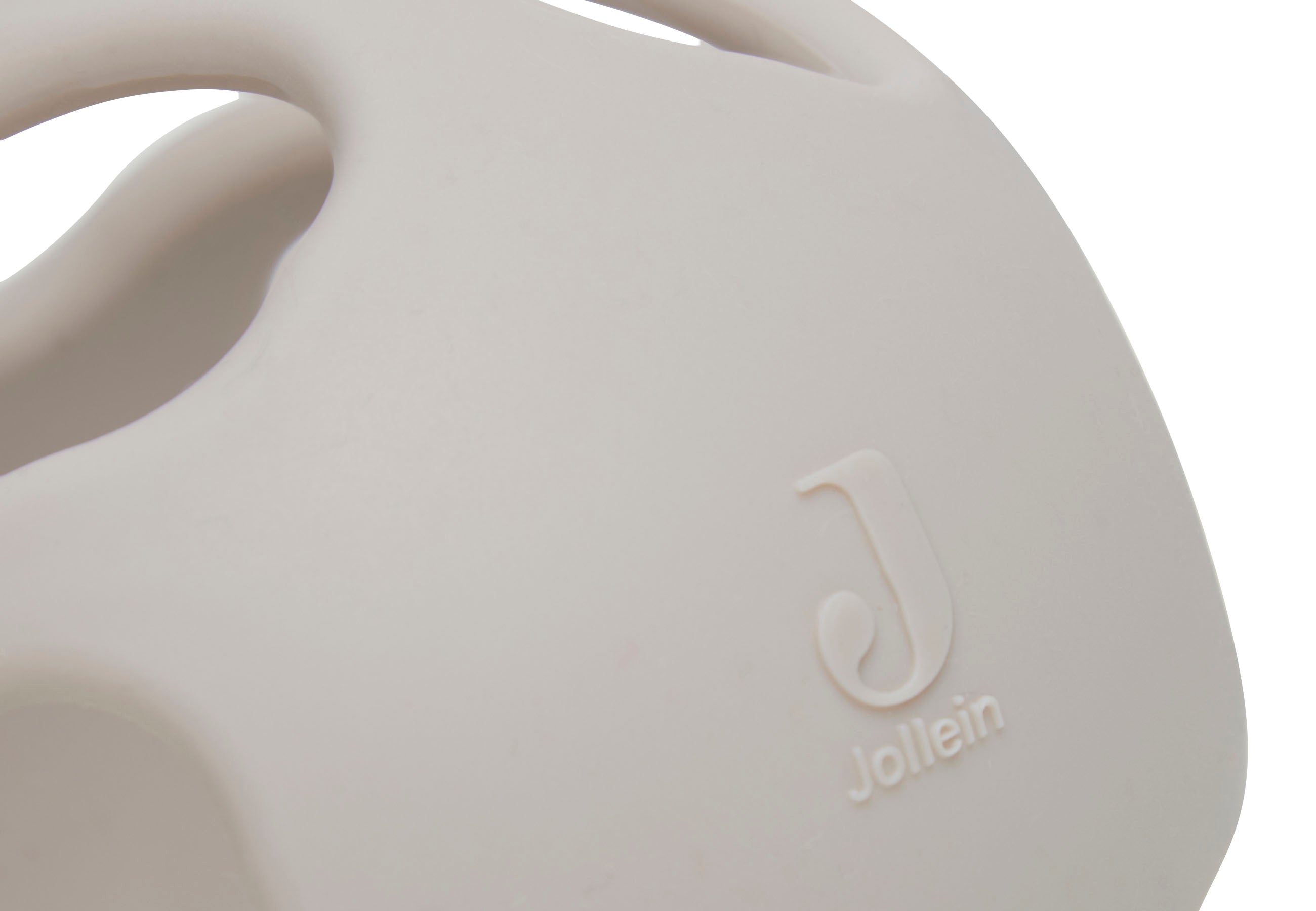 Balle de dentition en silicone nougat Jollein tenue en main