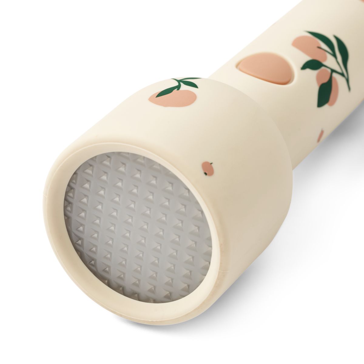Lampe torche Gry Liewood Peach Sea Shell allumée avec dragonne