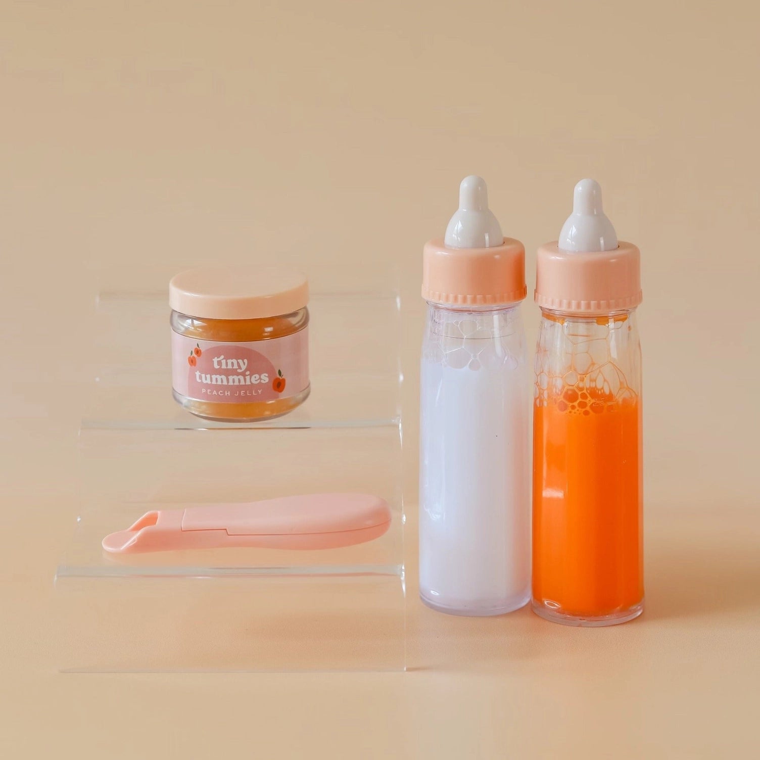 Biberons magiques Tiny Harlow lait et jus de fruit
