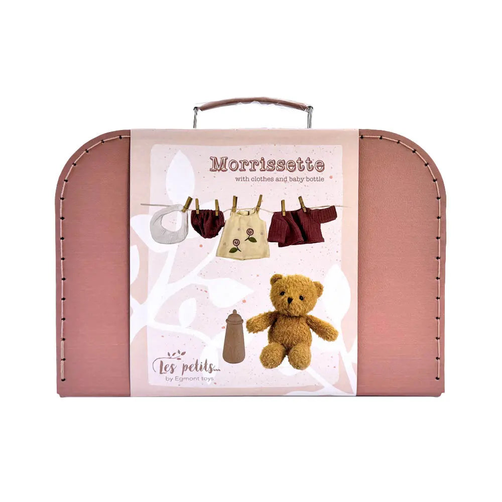 Morrissette l'ourse avec vêtements dans une valise