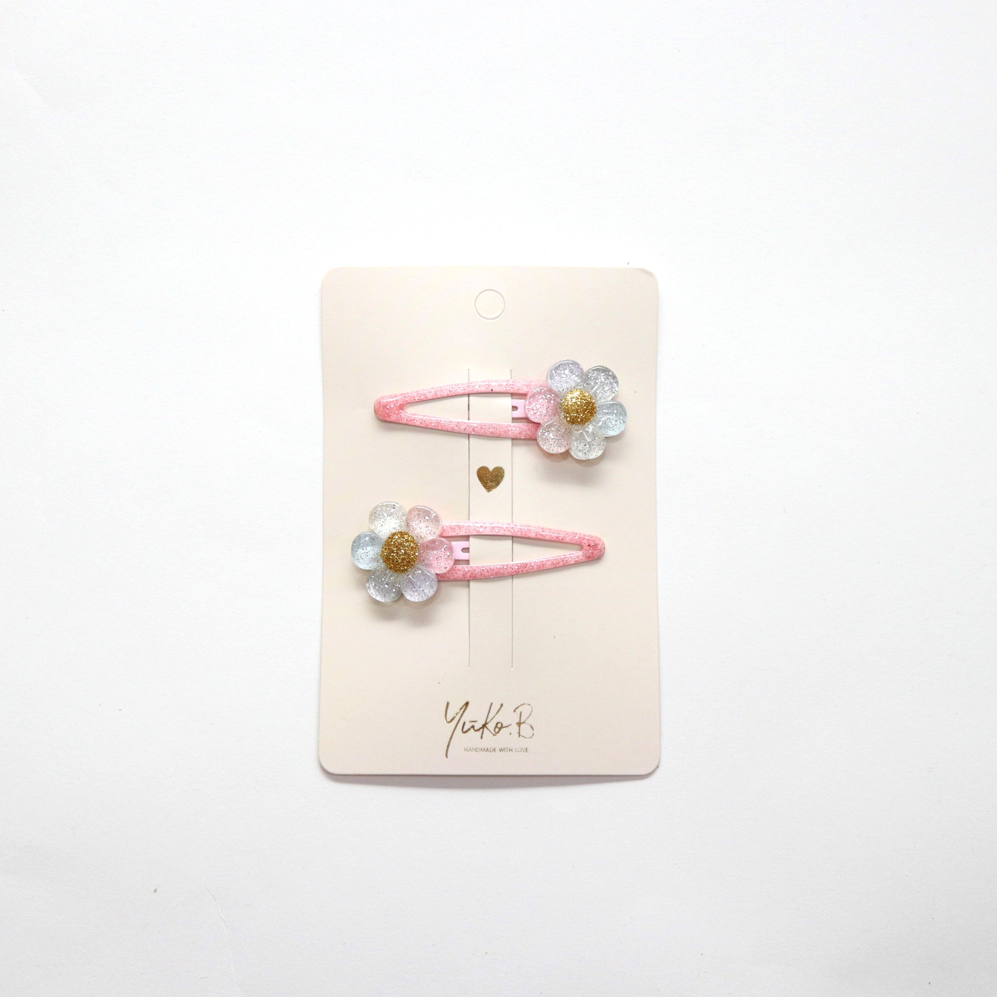 Barrettes marguerites Daisies Yuko B. en gros plan
