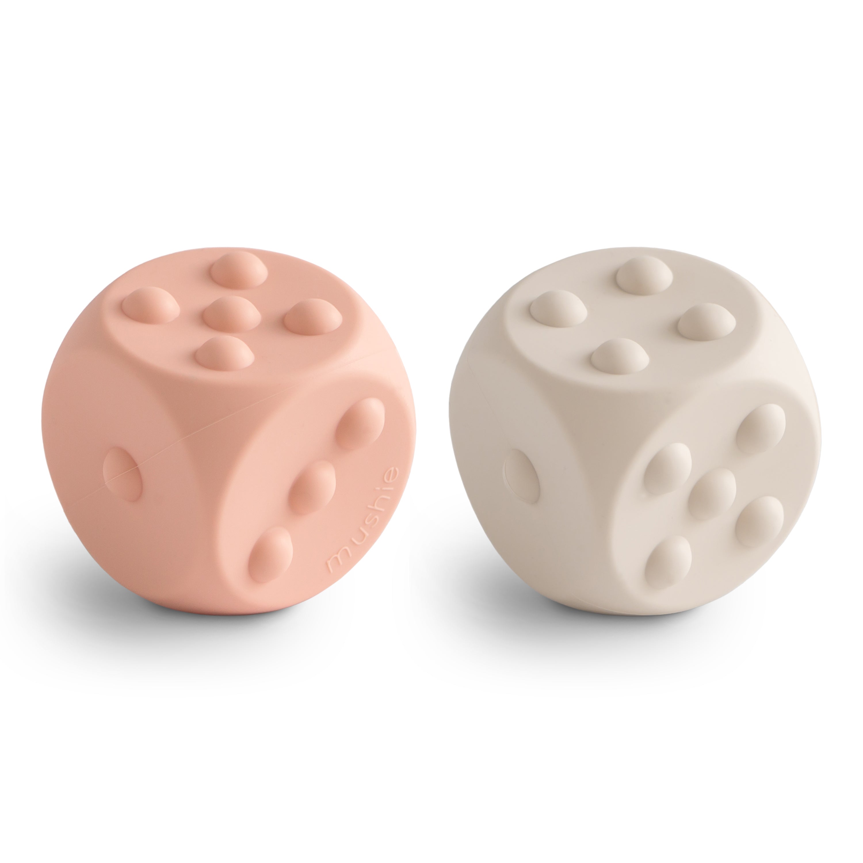Dés à presser Mushie Blush et Shifting Sand en silicone
