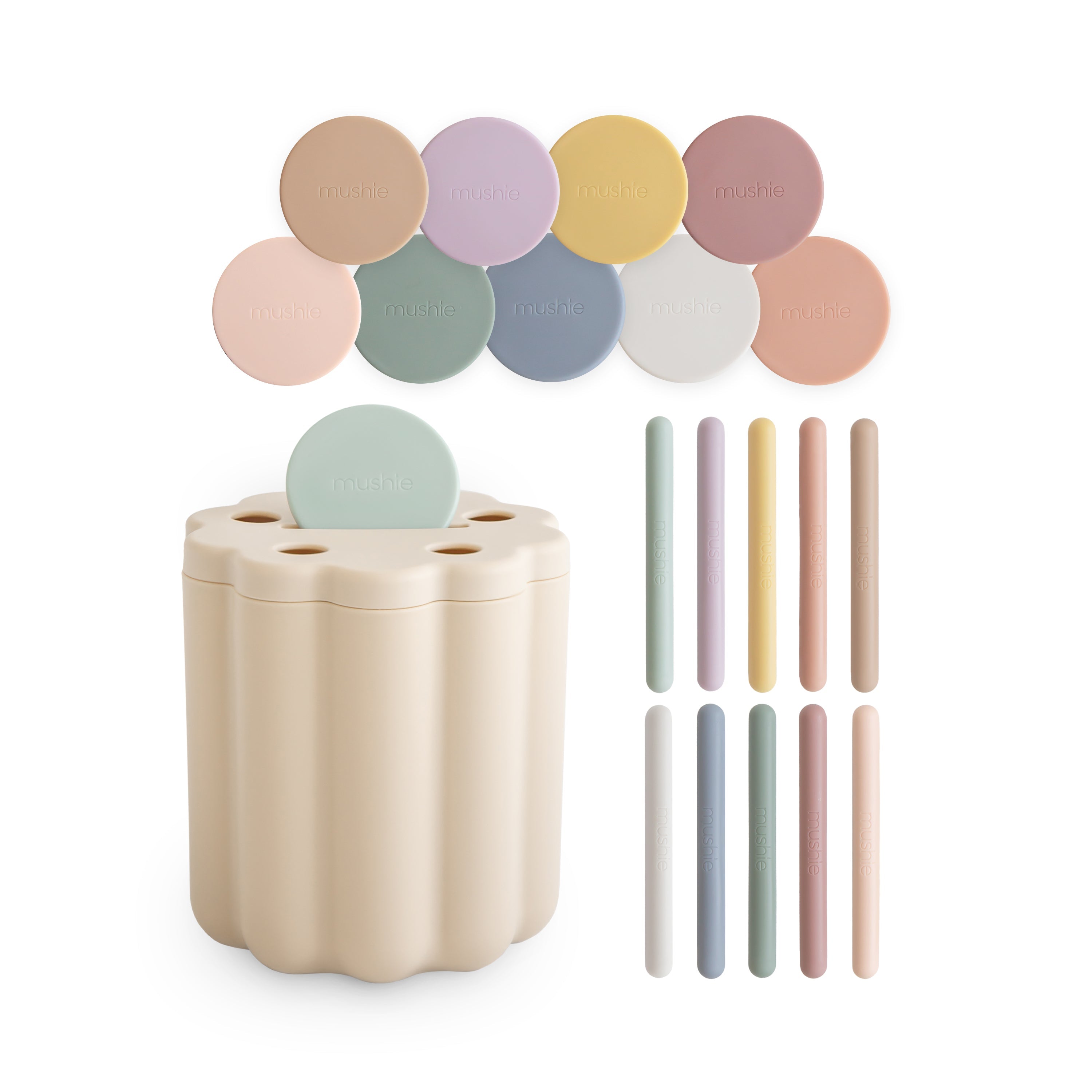 Boîte de tri Mushie avec ses pièces et tubes pastel