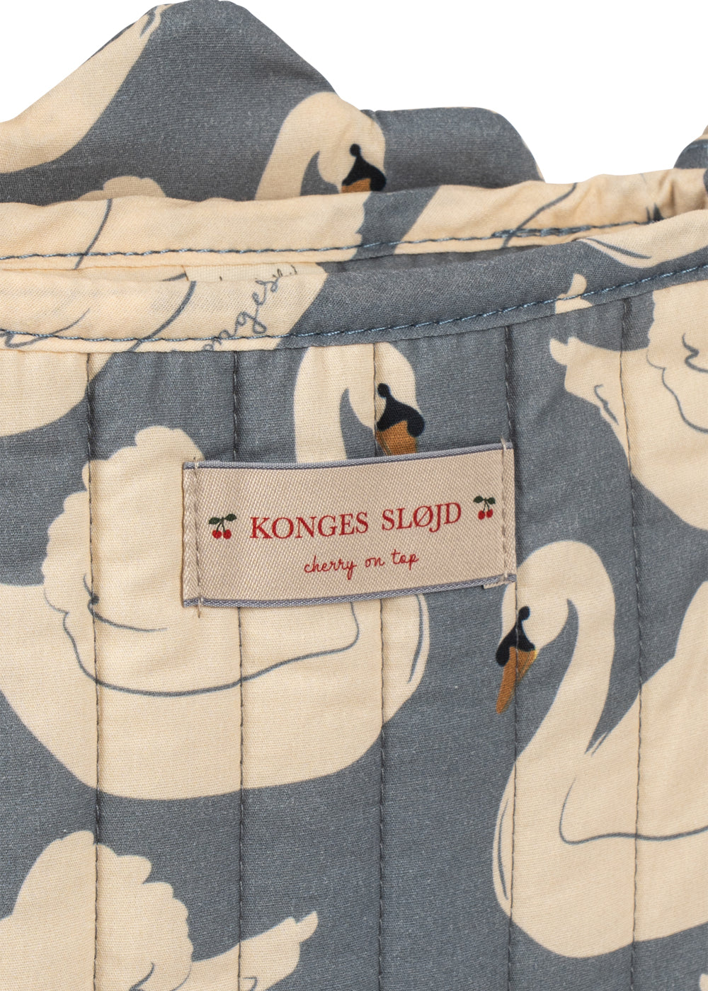 Sac de transport assorti accroché au guidon de la poussette Swan